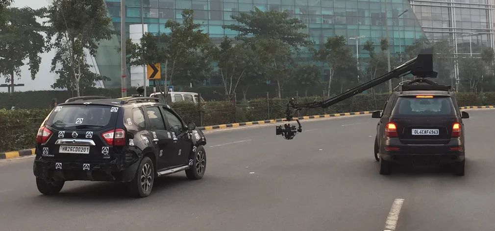 Behind the scenes as a camera car with crane arm films for the Škoda Vision IN